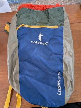 cotopaxi Blue Multi Luzon 18L Roll-Top Daypack with Yellow Accents